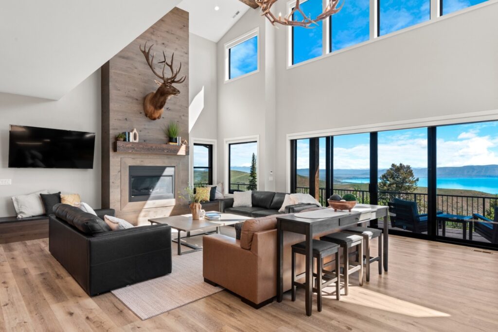 100 Acre Lodge's family room, open to above, overlooking Bear Lake.